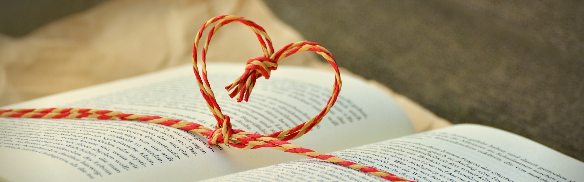 Image of a book with a red heart